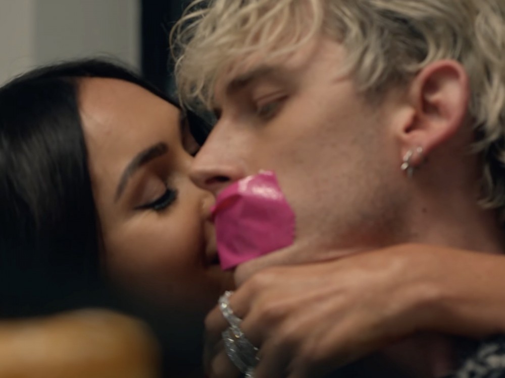 Machine Gun Kelly + Megan Fox Give Police Officers A Show