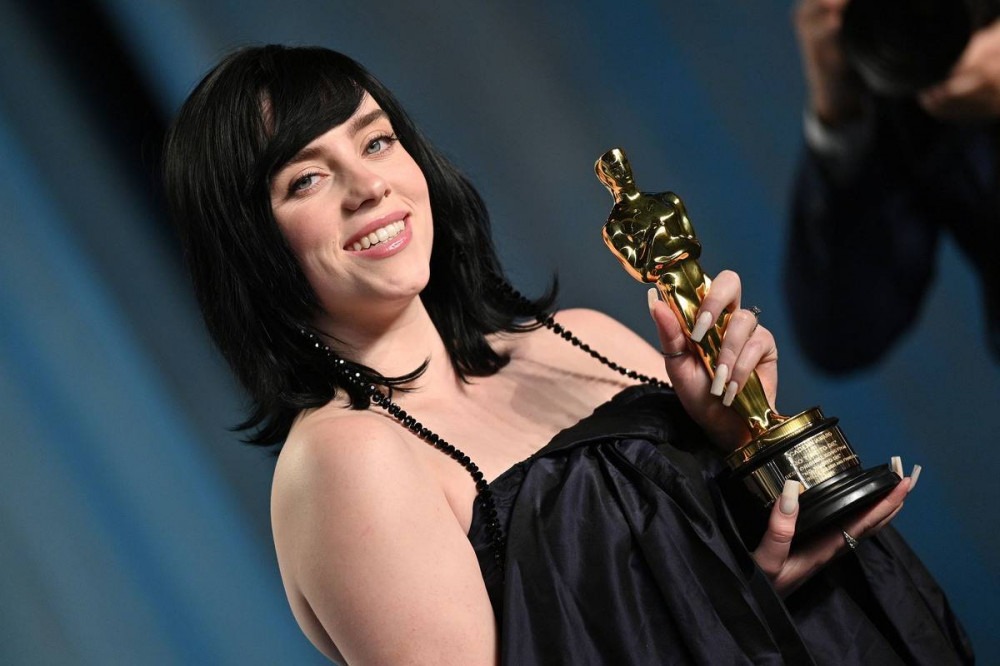 Billie Eilish, Fresh Off Winning An Oscar, Wants The World To Know She’s Happy